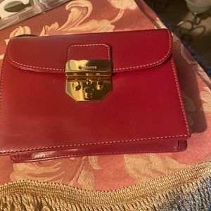 Crossbody Bag with gold hardware.